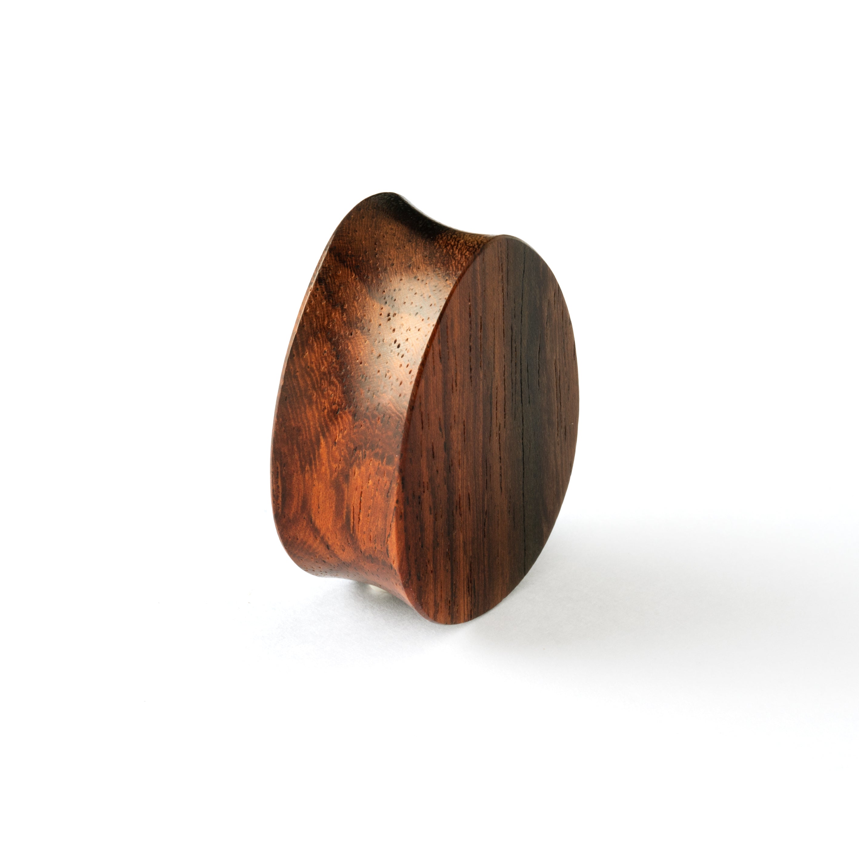 single ebony wood ear plug teardrop shaped with abalone inlay back view