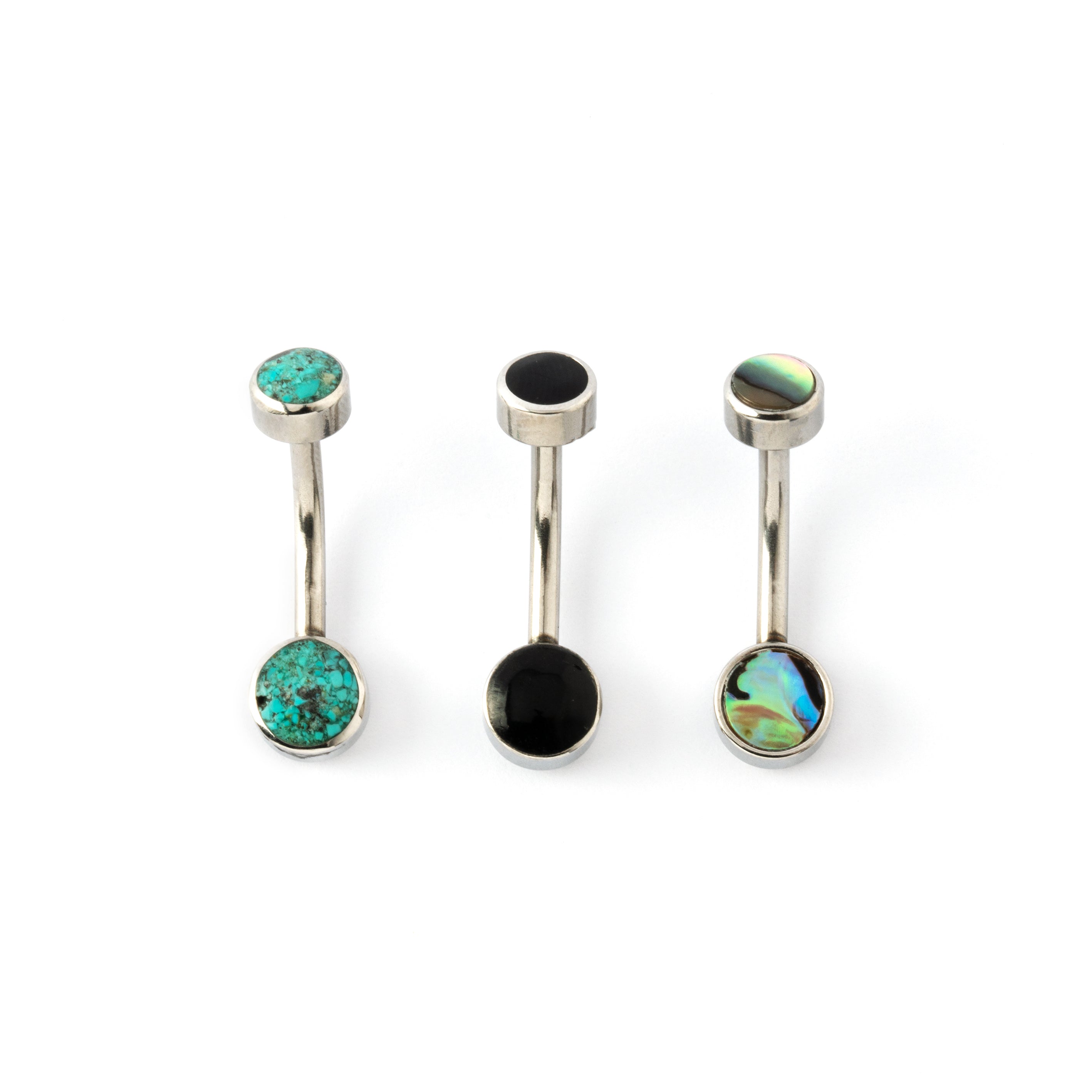 collection of surgical steel navel bars with abalone, black shell and turquoise