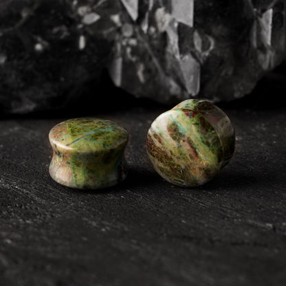 pair of African Jade stone plugs with double flared ends front and side view