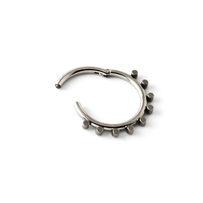elegant and minimalist surgical steel piercing clicker ring with geometric spheres closure view