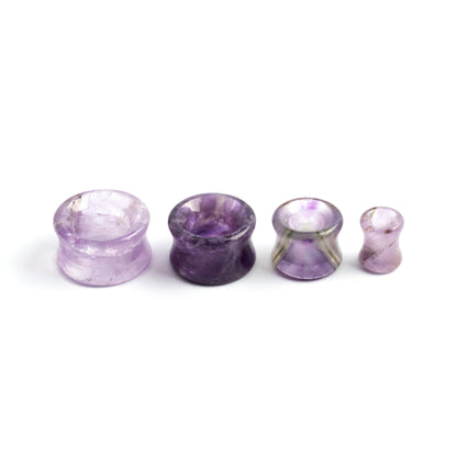Amethyst Plug Tunnel | Tribu Londonseveral sizes of Amethyst double flare stone ear tunnel side view