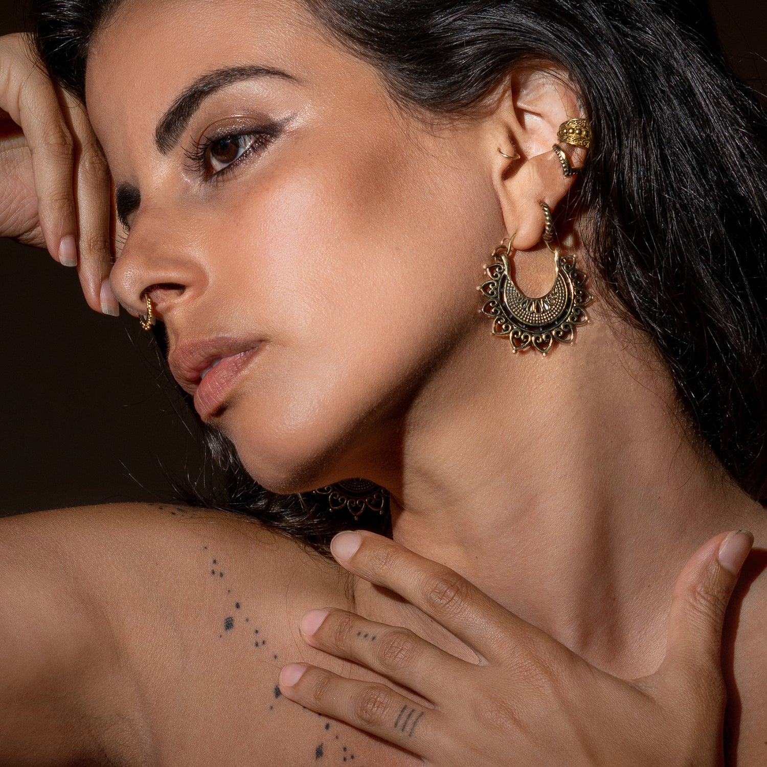 model wearing Amisha Earrings