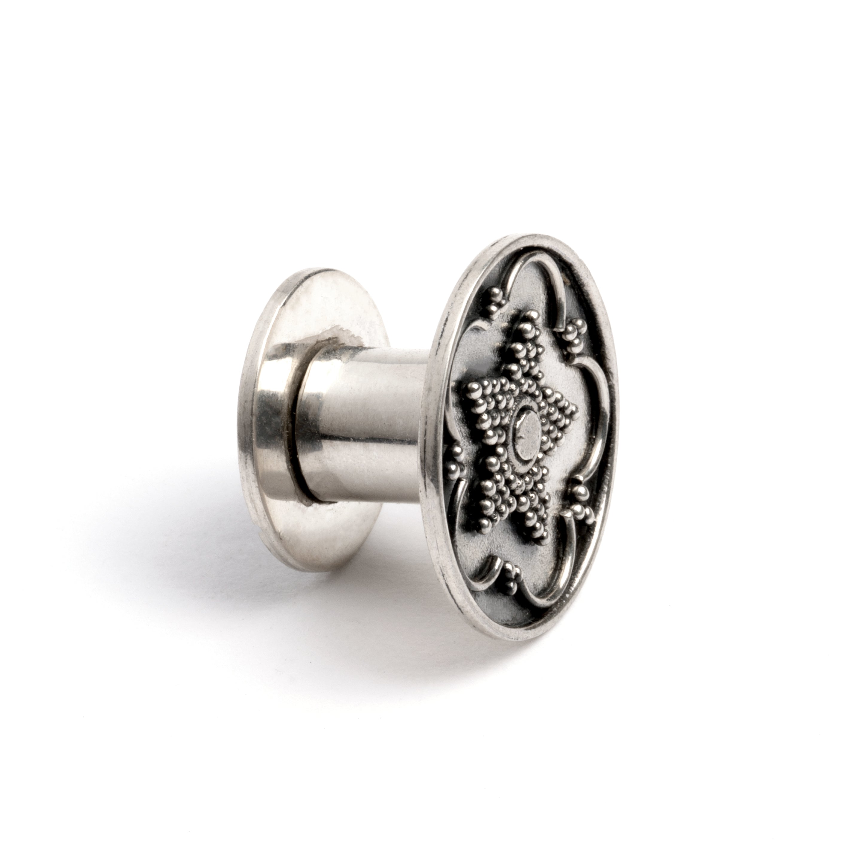 single Antique Silver Plug Tunnel with star ornament and a screw on closure side view