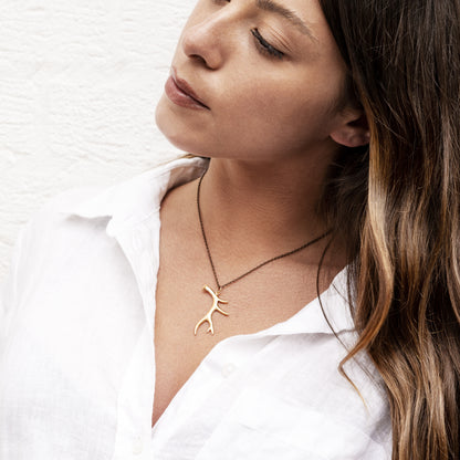 model wearing Antler Bronze Necklace