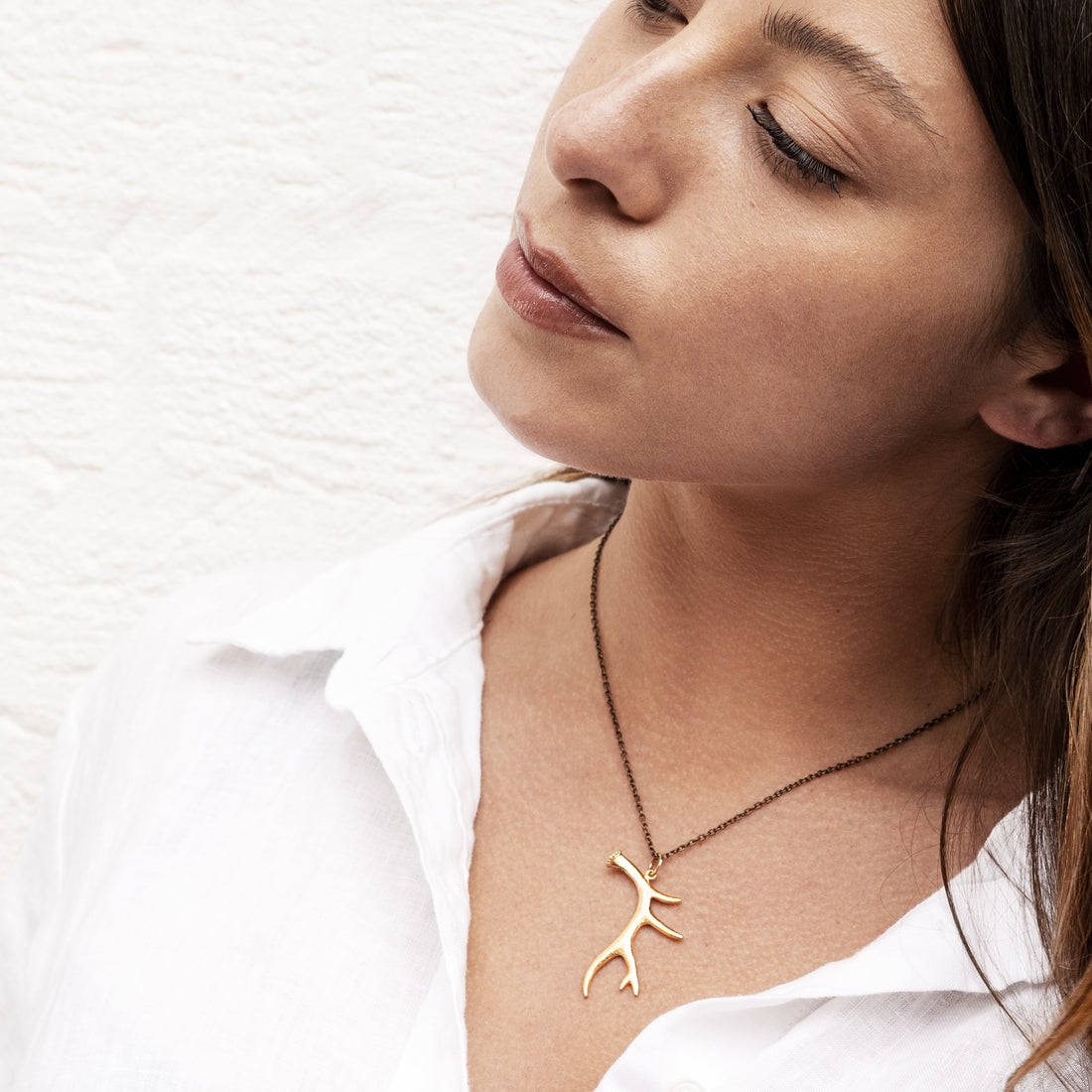 model wearing Antler Bronze Necklace 
