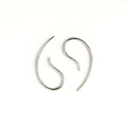 pair of silver wire tiny hook earrings side view