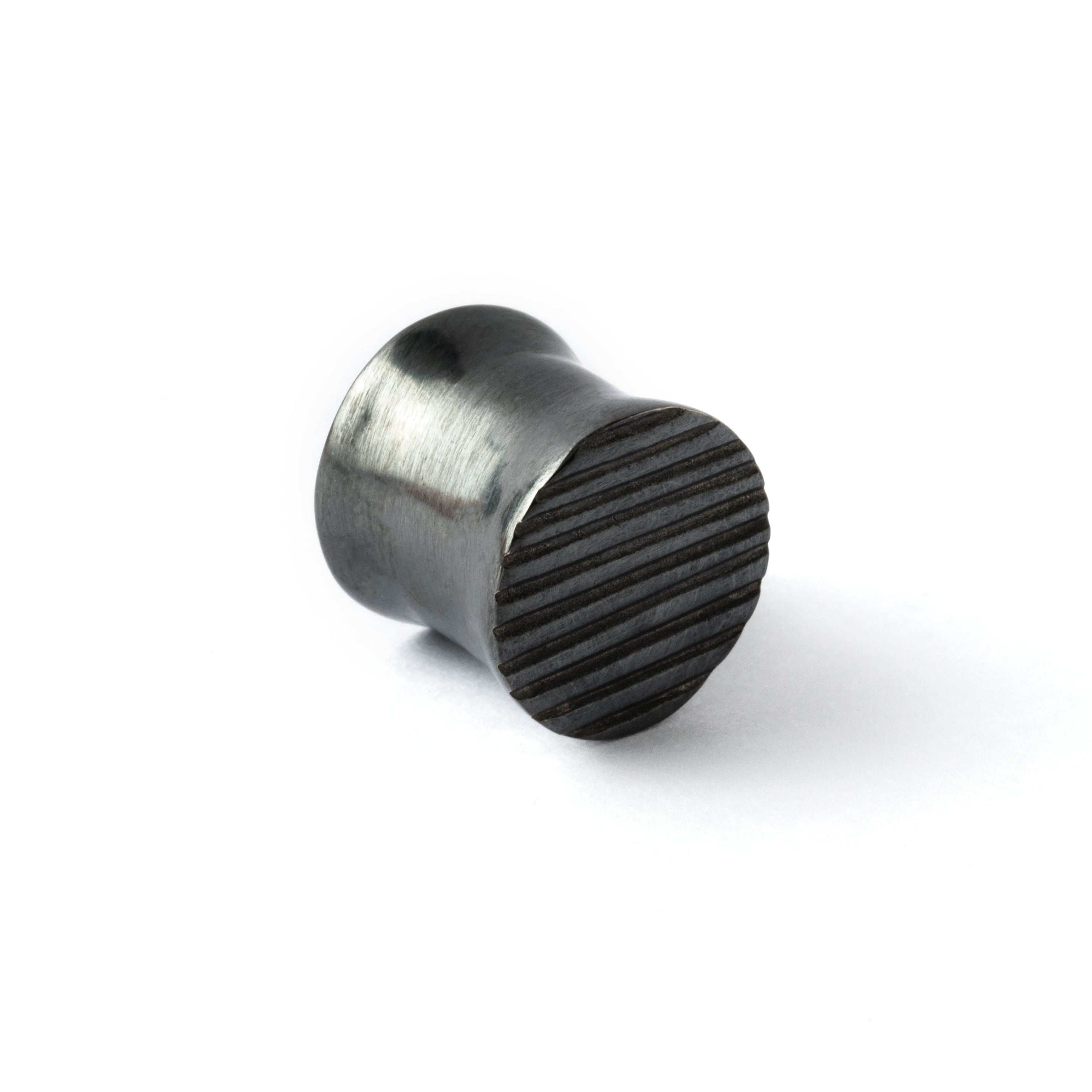 double flared black silver scratched ear plug left front view