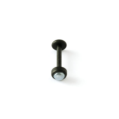 matte black surgical steel with black pearl labret stud above view