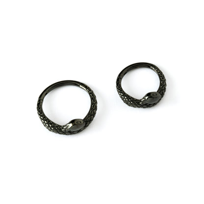8mm and 10mm shiny black surgical steel snake piercing clicker rings frontal view
