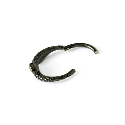 shiny black surgical steel snake piercing clicker ring closure view