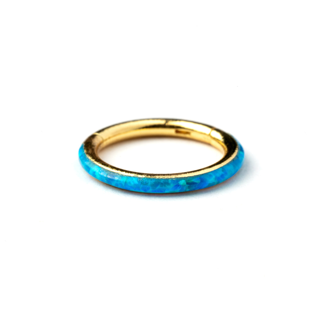 Gold surgical steel septum clicker ring with blue opal inlay side view