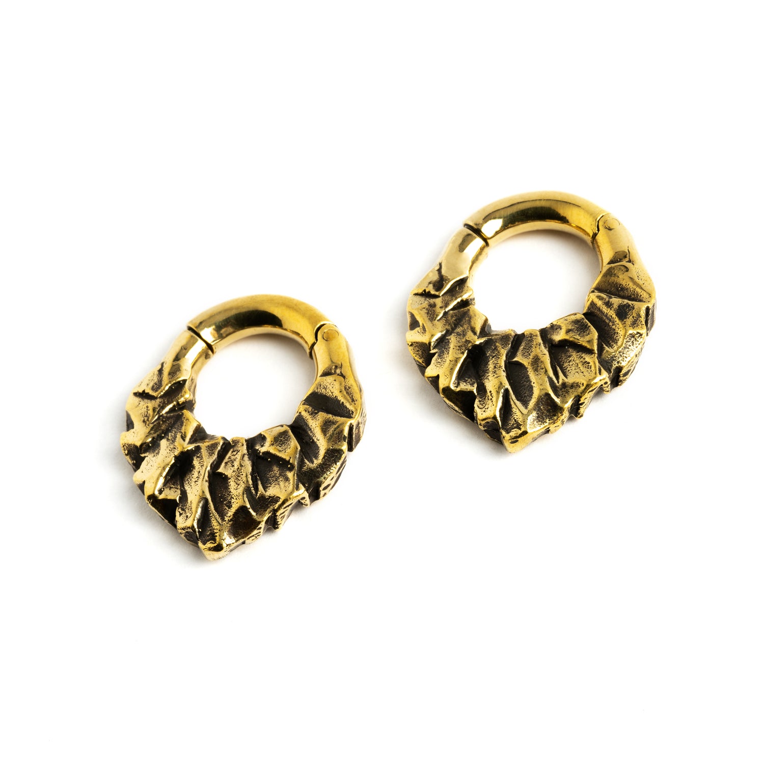 pair of gold brass teardrop shaped ear hoops hangers with rocky texture left front view