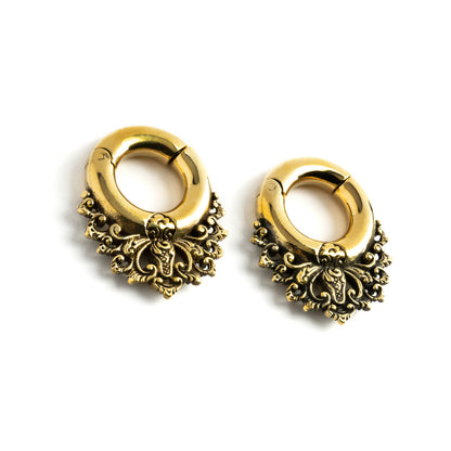 pair of gold brass ear hangers hoops with floral victorian design left front view