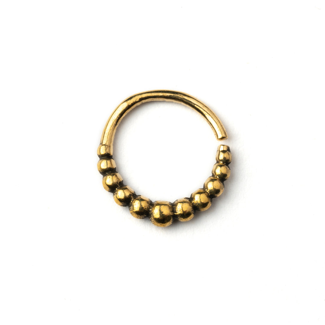 Mouji golden brass septum ring frontal view