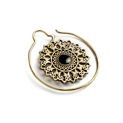 single brass large flower mandala earring with centred black onyx right side view