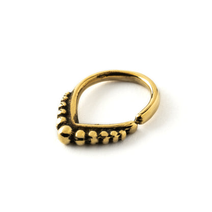 Brass delicate septum piercing ring side view