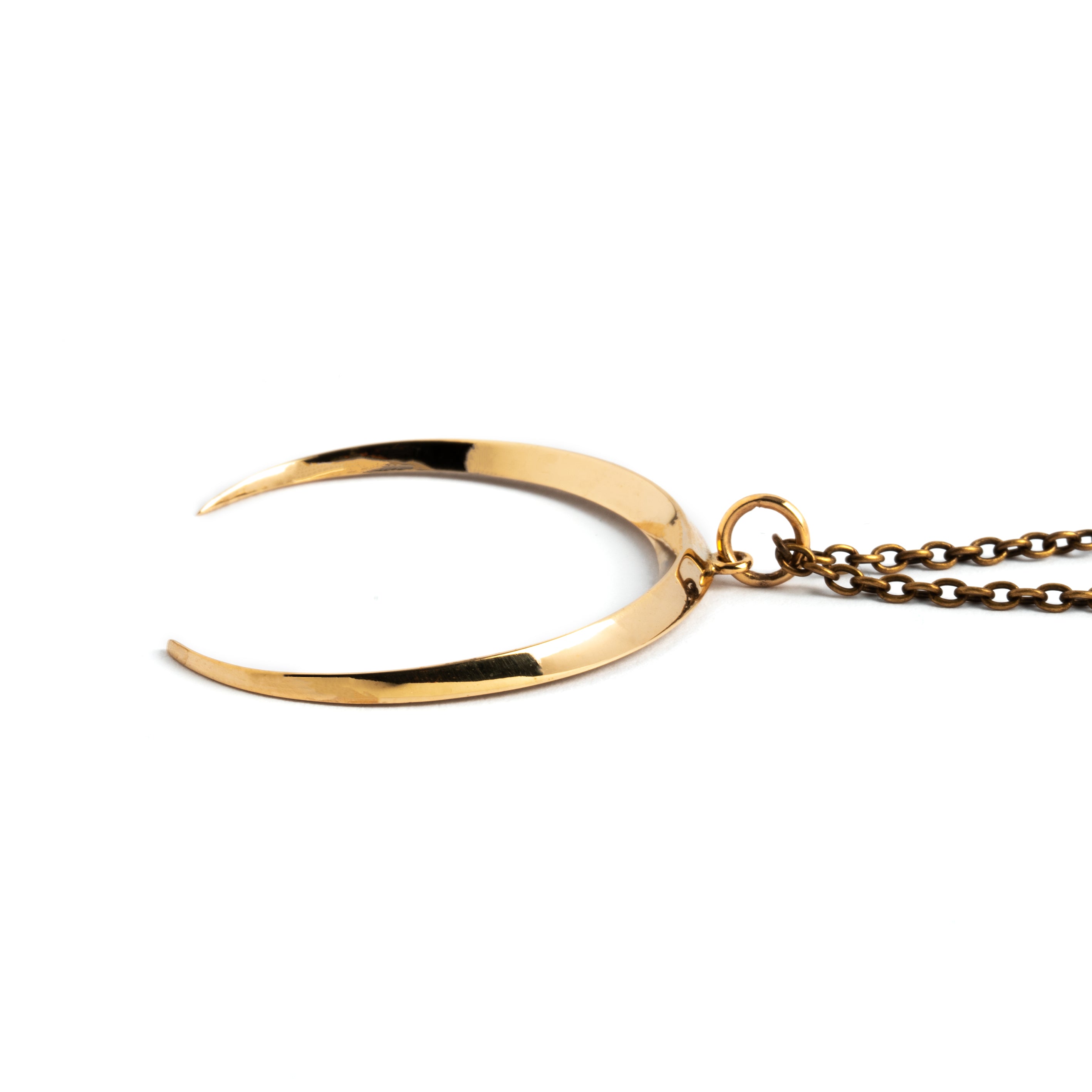 Crescent moon pendant necklace in bronze side view