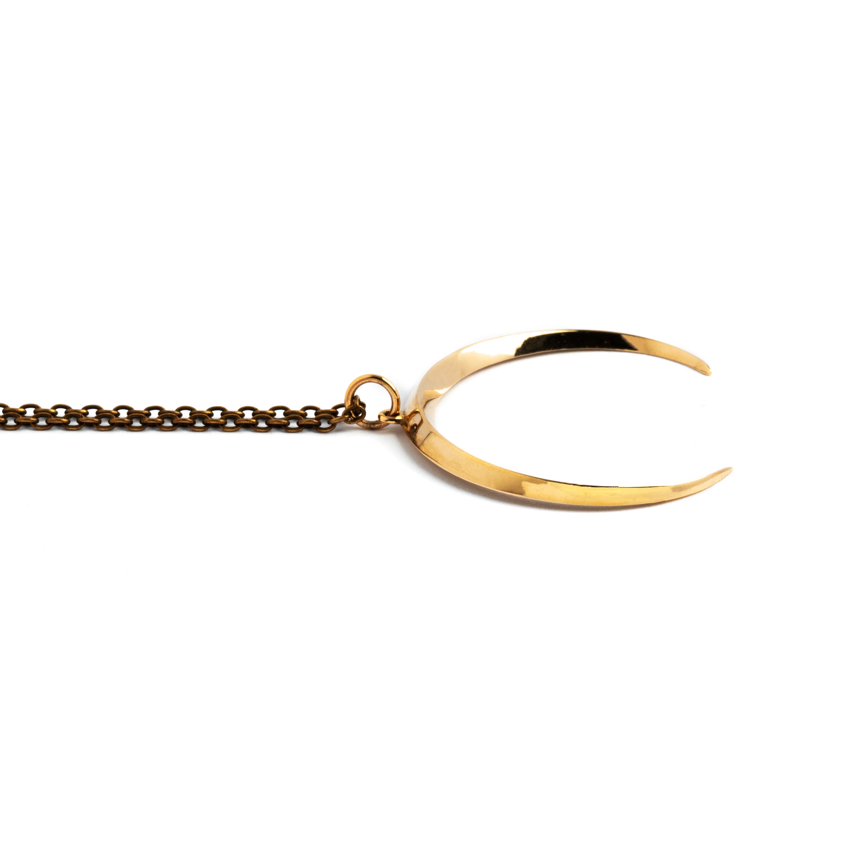 Crescent moon pendant necklace in bronze side view