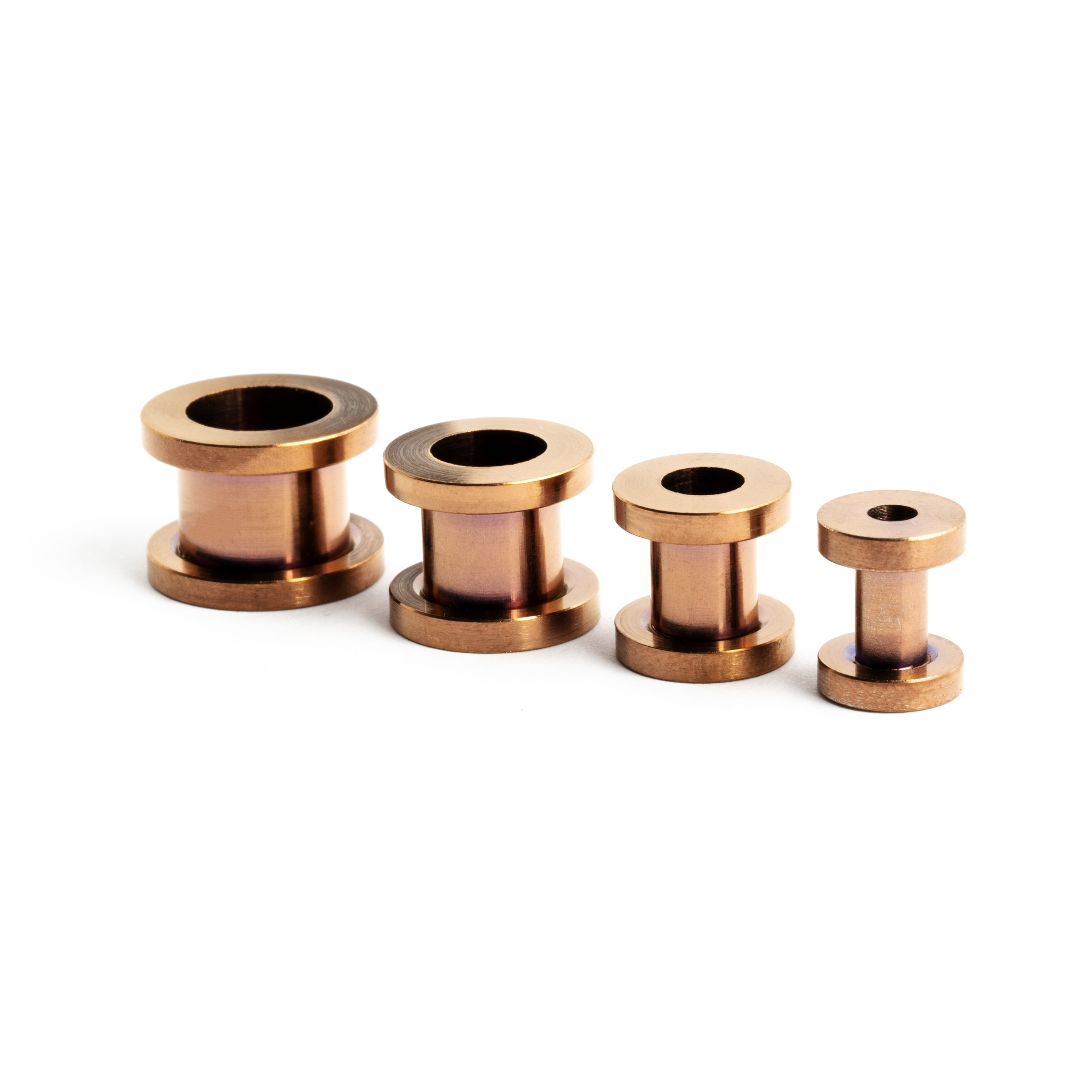 several sizes of bronze surgical steel ear tunnels with double flared ends side view