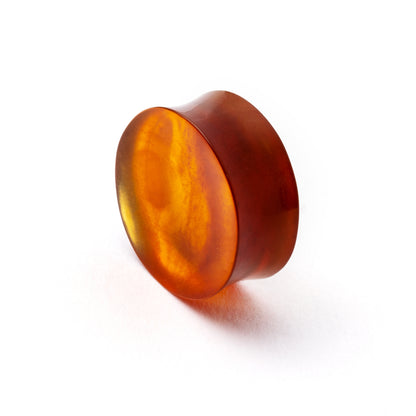 single Burmese Amber double flare stone ear plug front side view