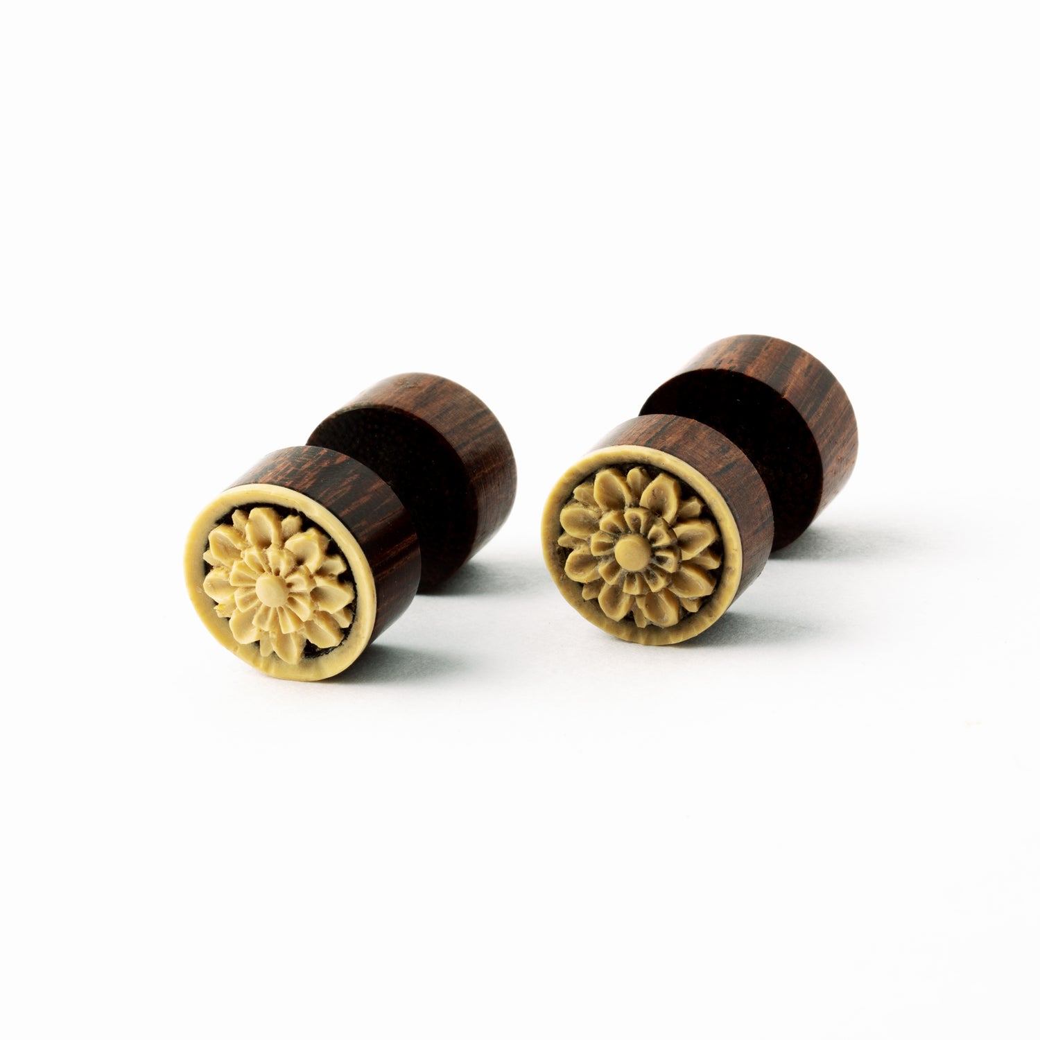 pair of carved Lotus wood fake gauge plug earrings left side view