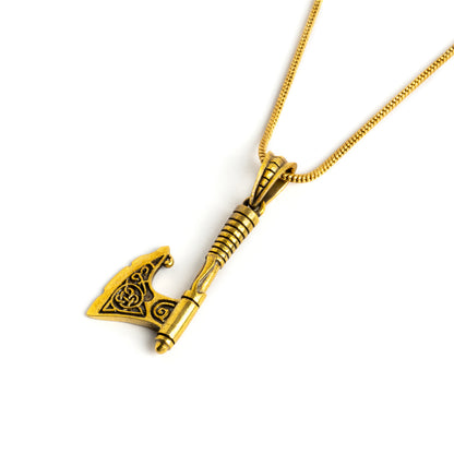 golden brass Celtic axe pendant on a brass chain left side view