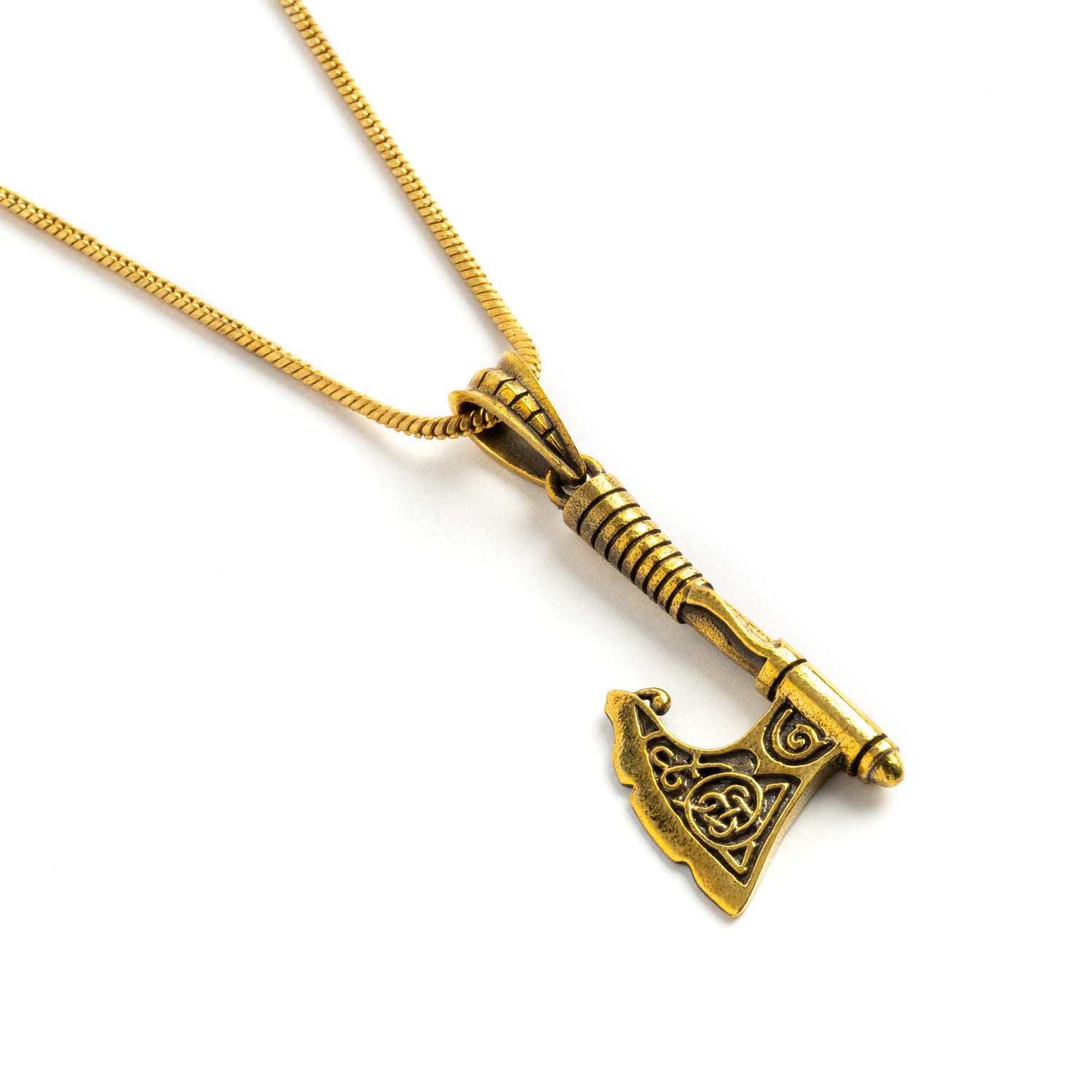 golden brass Celtic axe pendant on a brass chain left side close up view