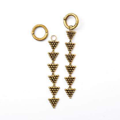 Pair of hoop ear weights with triangles drop frontal view