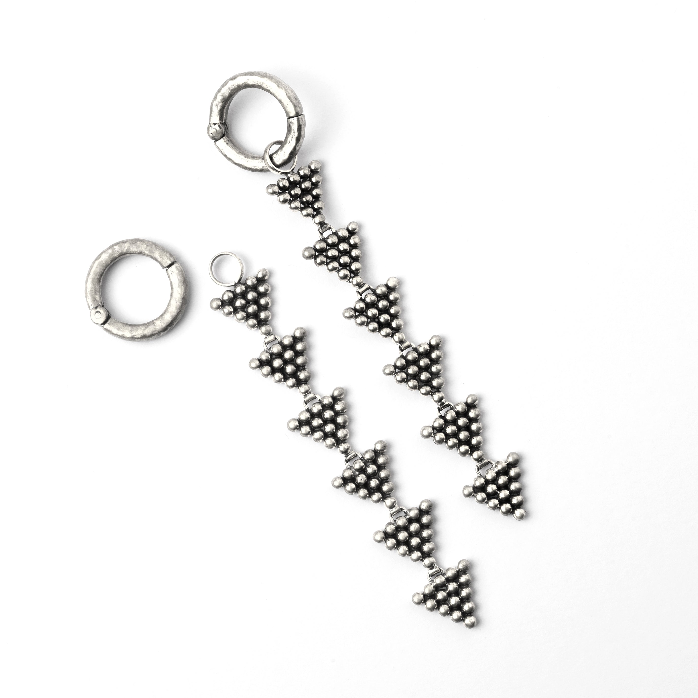 Pair of hoop ear weights with triangles drop frontal view