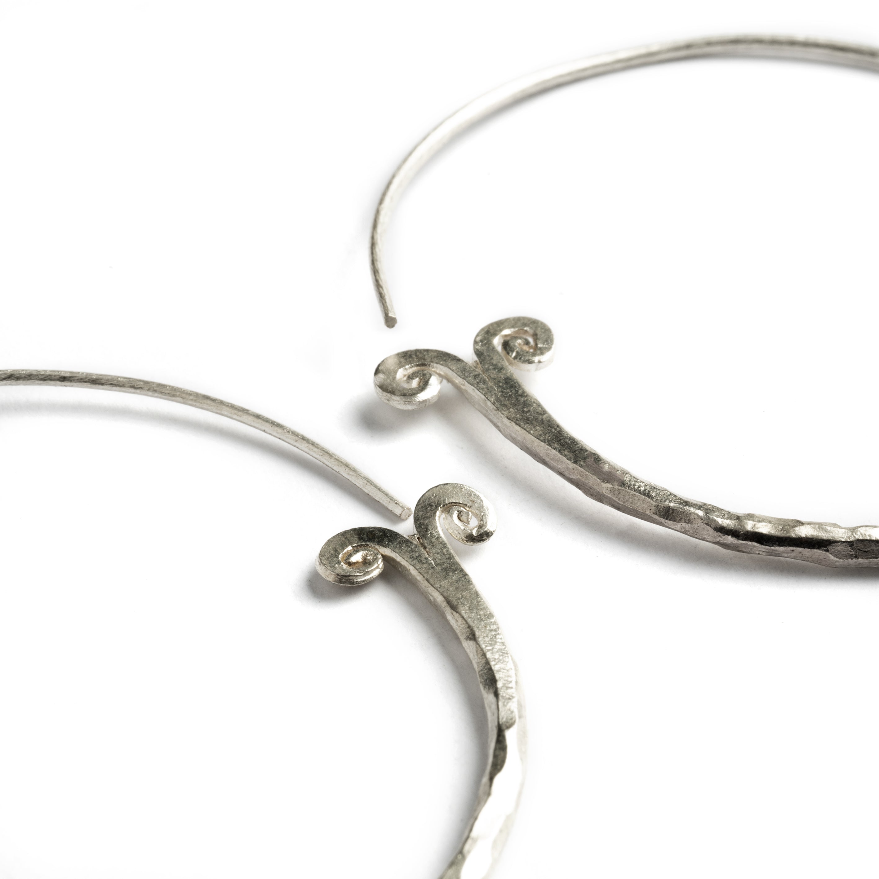 Chi Silver Hoops close up view view