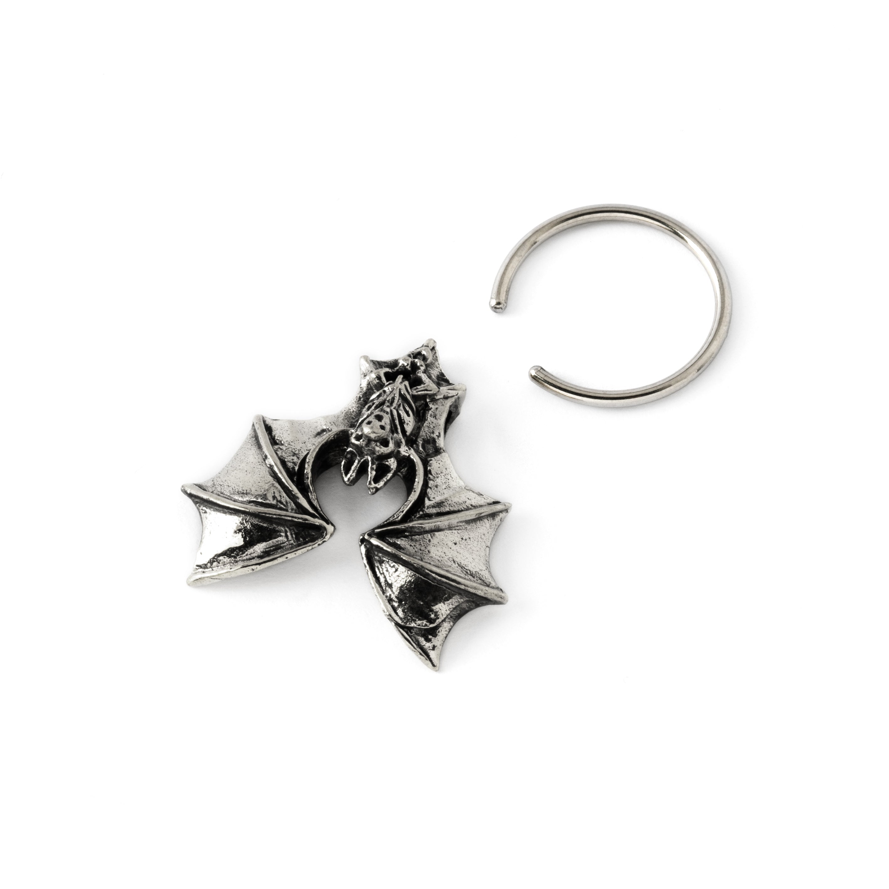 surgical steel finely detailed bat piercing ring closure view