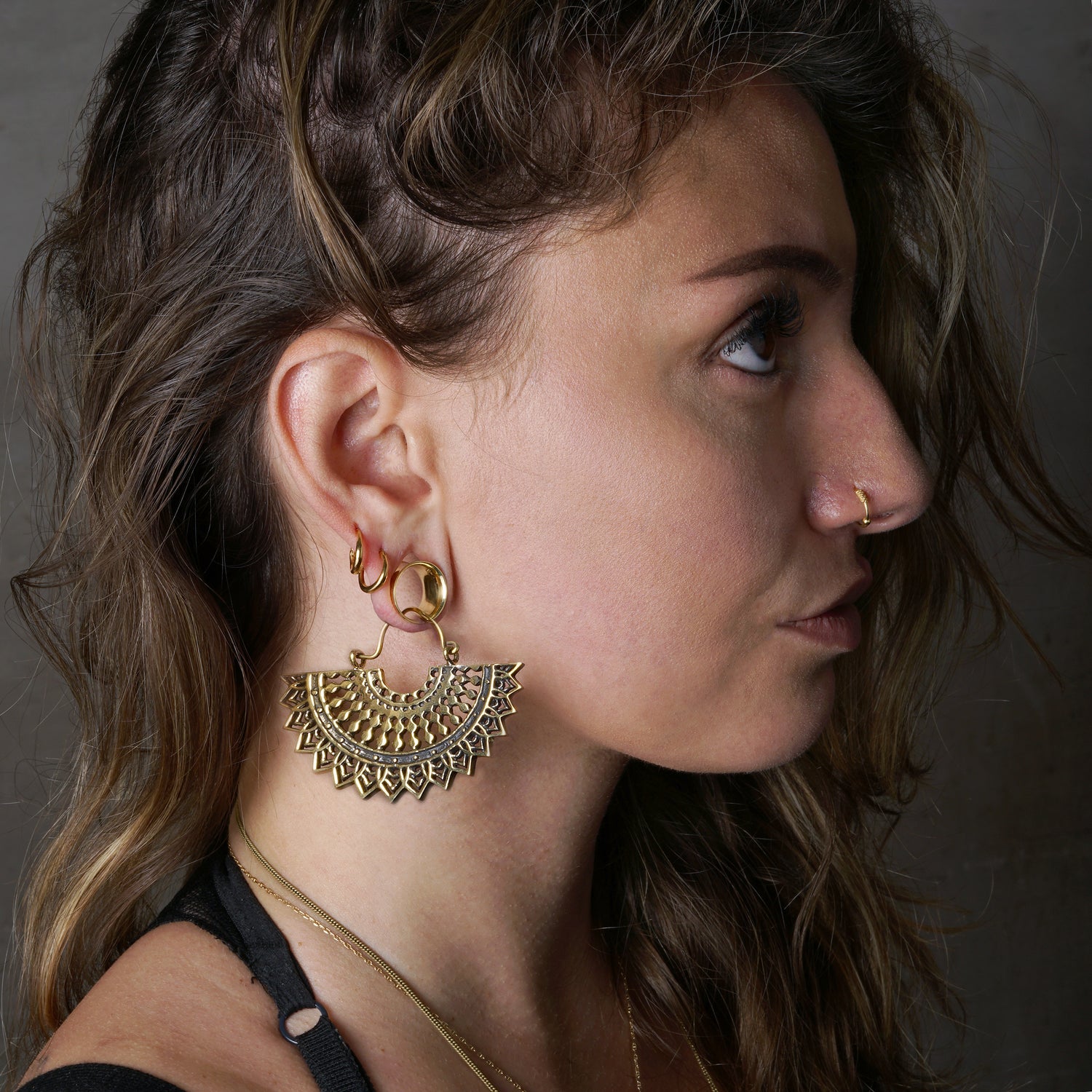model wearing Cleopatra Fan Earrings
