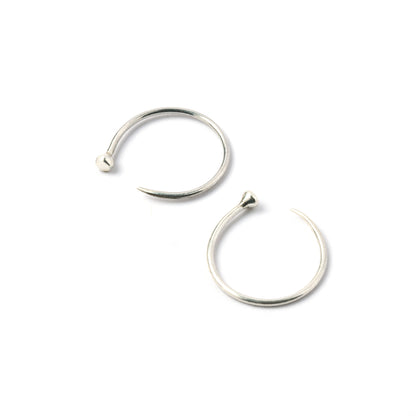 pair of open hoop silver wire earrings front and side view