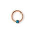 Rose gold Dayaa septum clicker with blue Opal frontal view