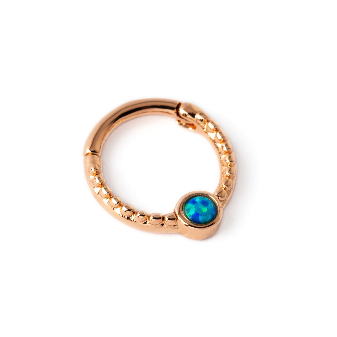Rose gold Dayaa septum clicker with blue Opal right side view