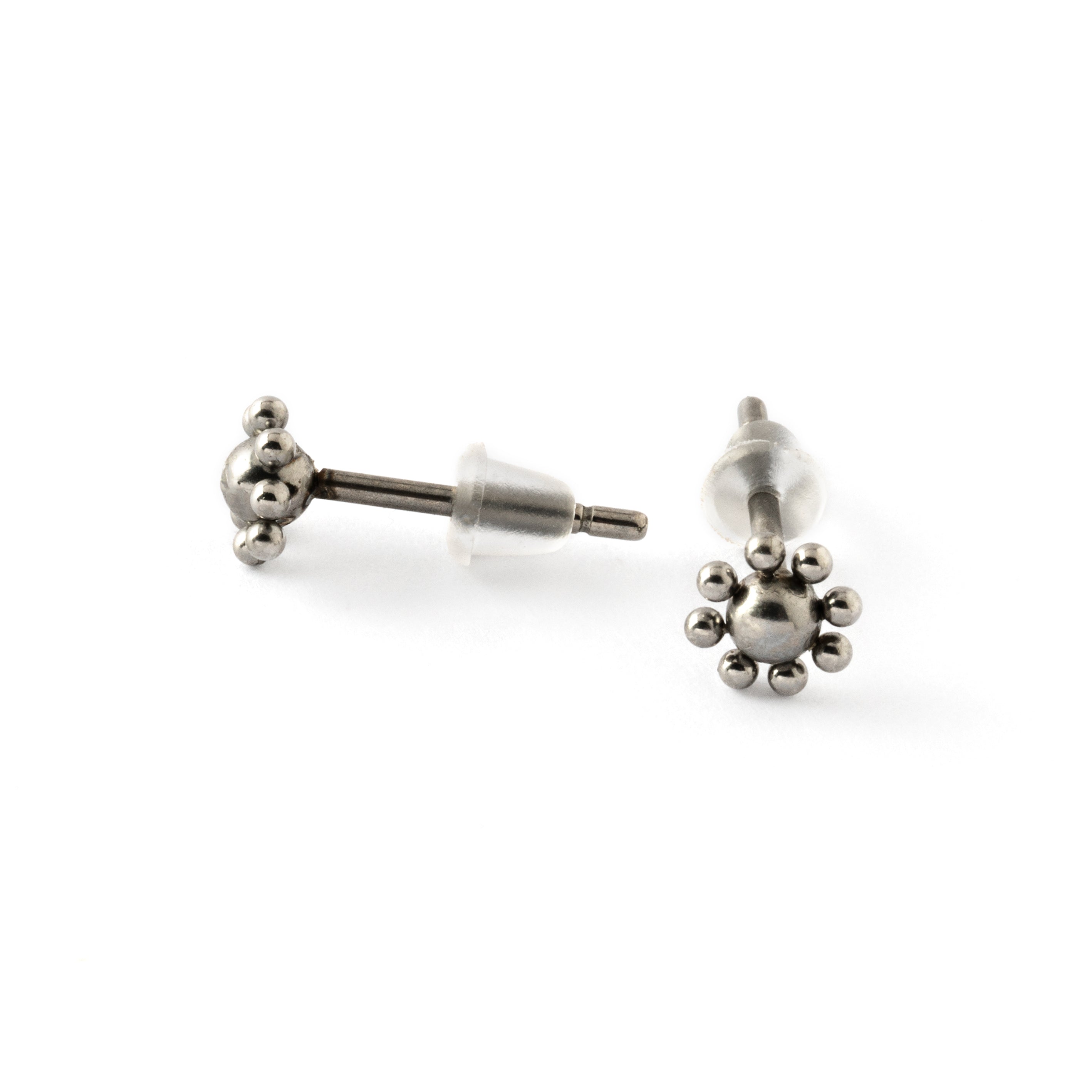 pair of surgical steel flower stud earrings front and side view 