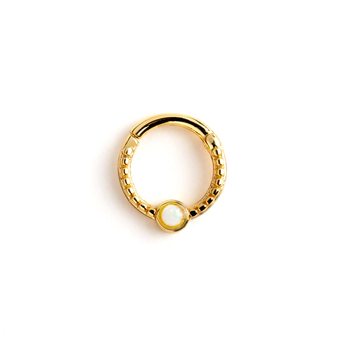 Dayaa gold surgical steel septum clicker with white opal frontal view