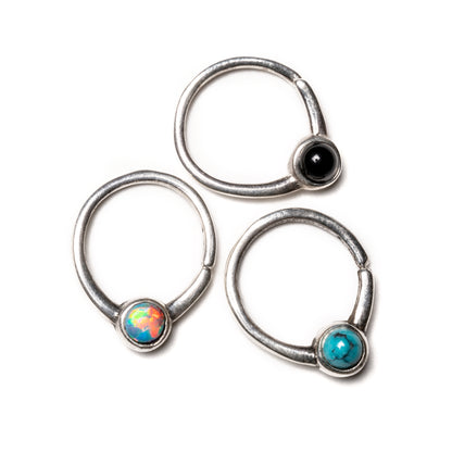 Devika silver septum rings with Turquoise, opal, onyx frontal view