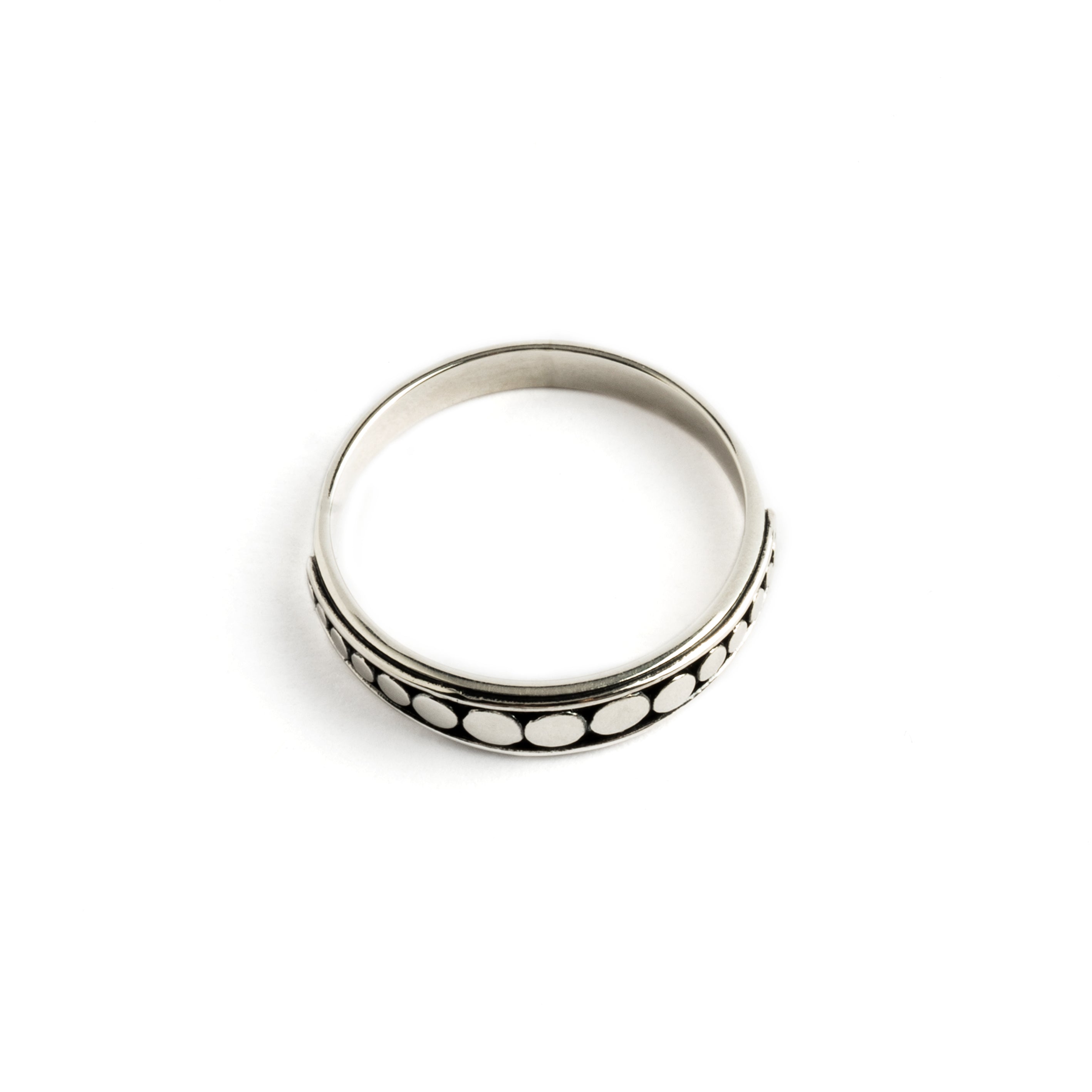 dotted silver band ring above view