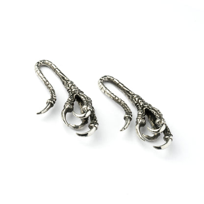 pair of silver brass dragon claw ear hangers right back view