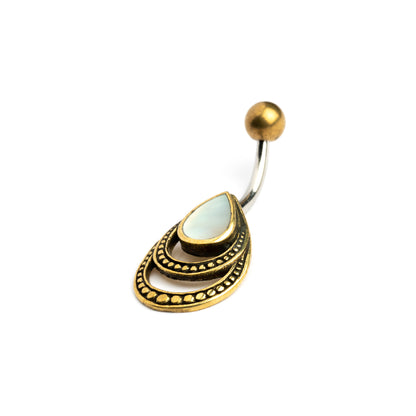 golden brass teardrop outlines belly bar with centred mother of pearl left side view