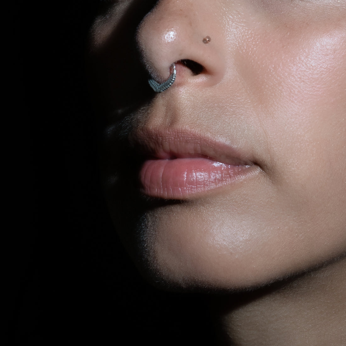 model wearing Fern Silver Septum Ring