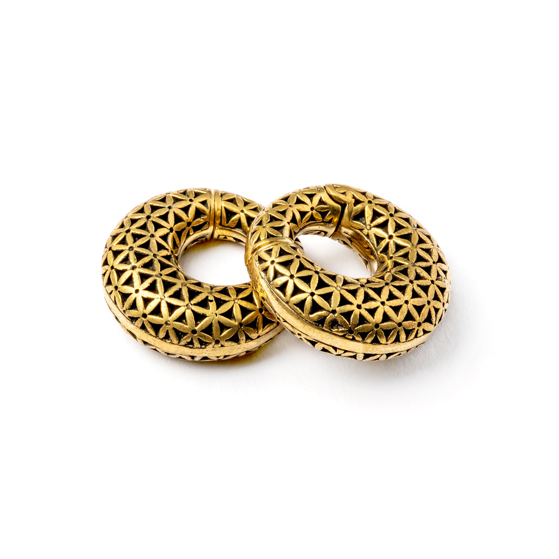 pair of gold brass ear weights hoops with flower of life pattern front and side view