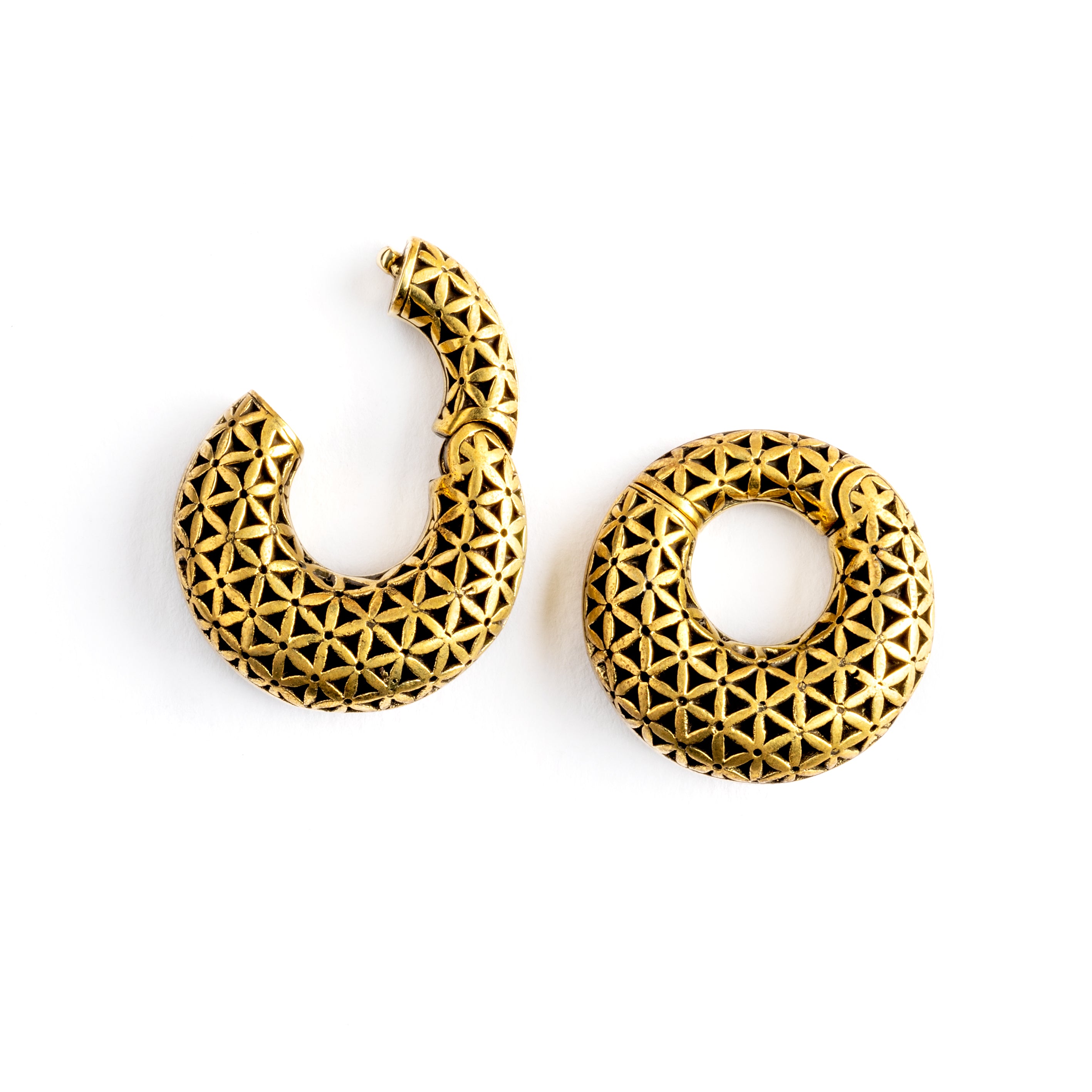 pair of gold brass ear weights hoops with flower of life pattern frontal locking system view