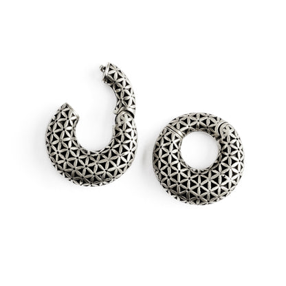 pair of silver brass ear weights hoops with flower of life pattern frontal locking system view