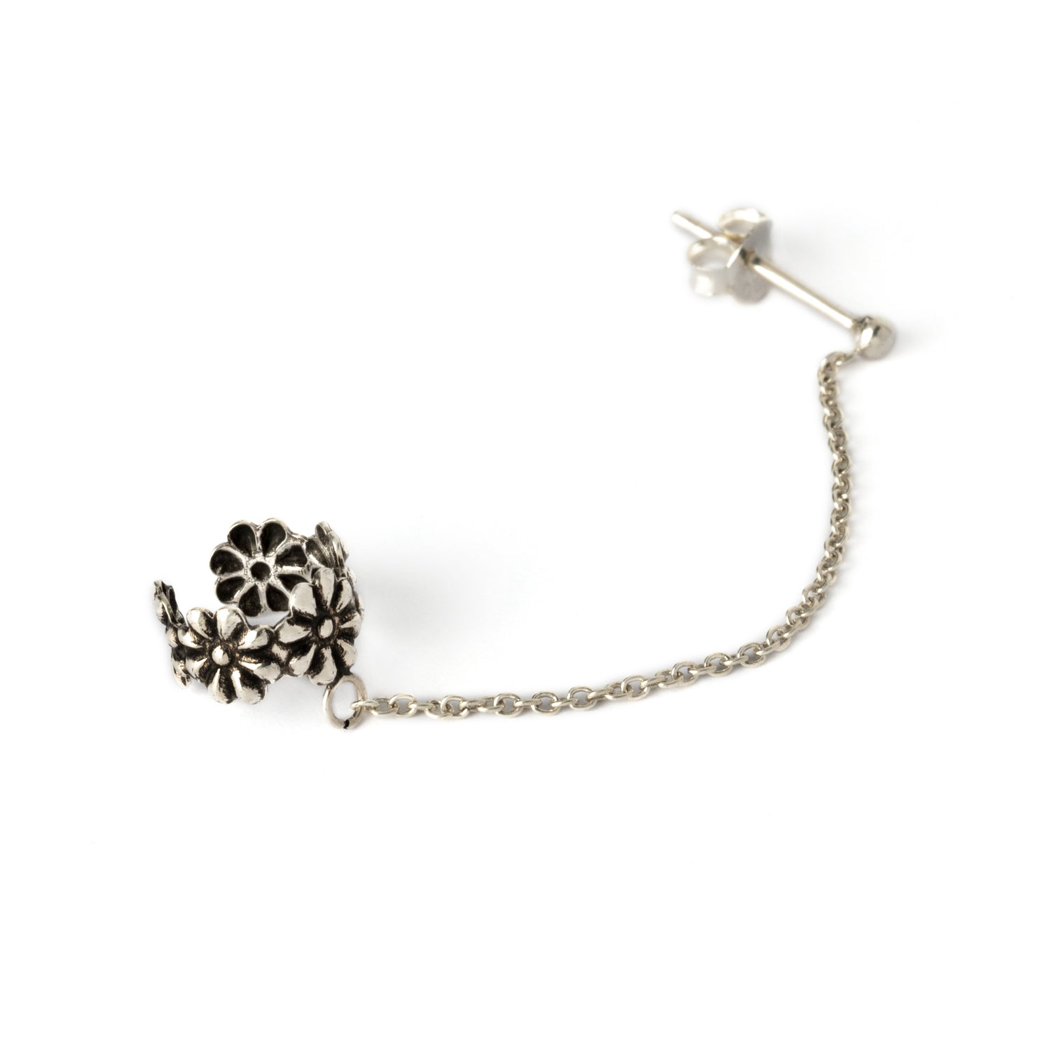floral silver ear cuff chained to a stud earring side view