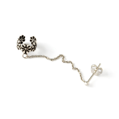 floral silver ear cuff chained to a stud earring 