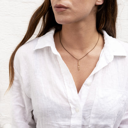 model wearing Four Elements Necklace