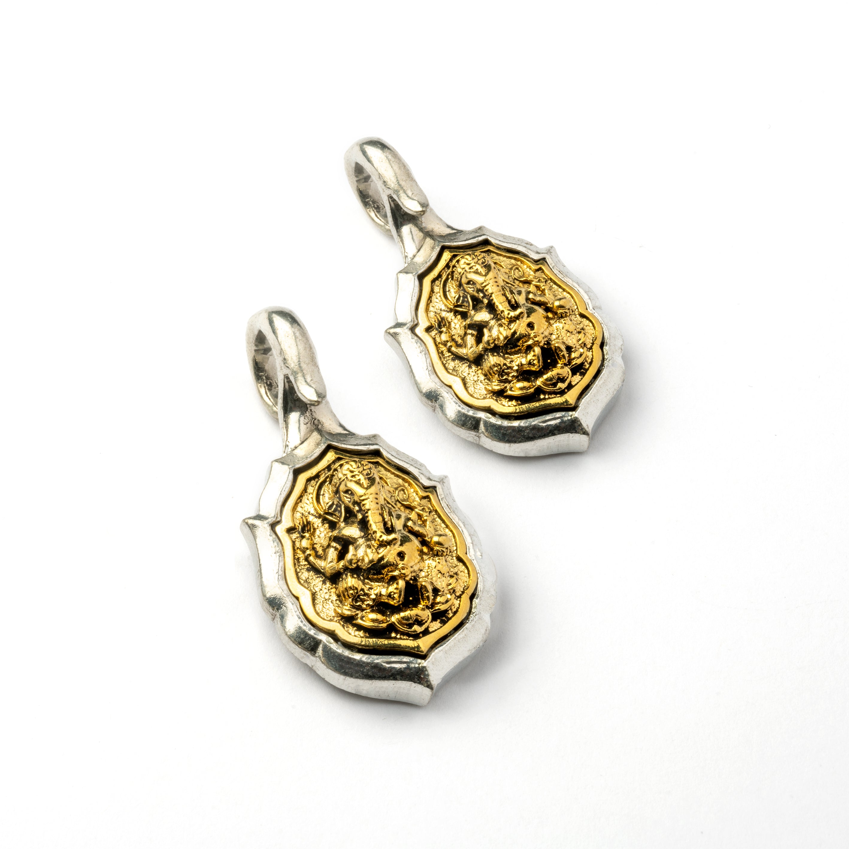pair of silver and gold Ganesh & Om ear weight hangers 