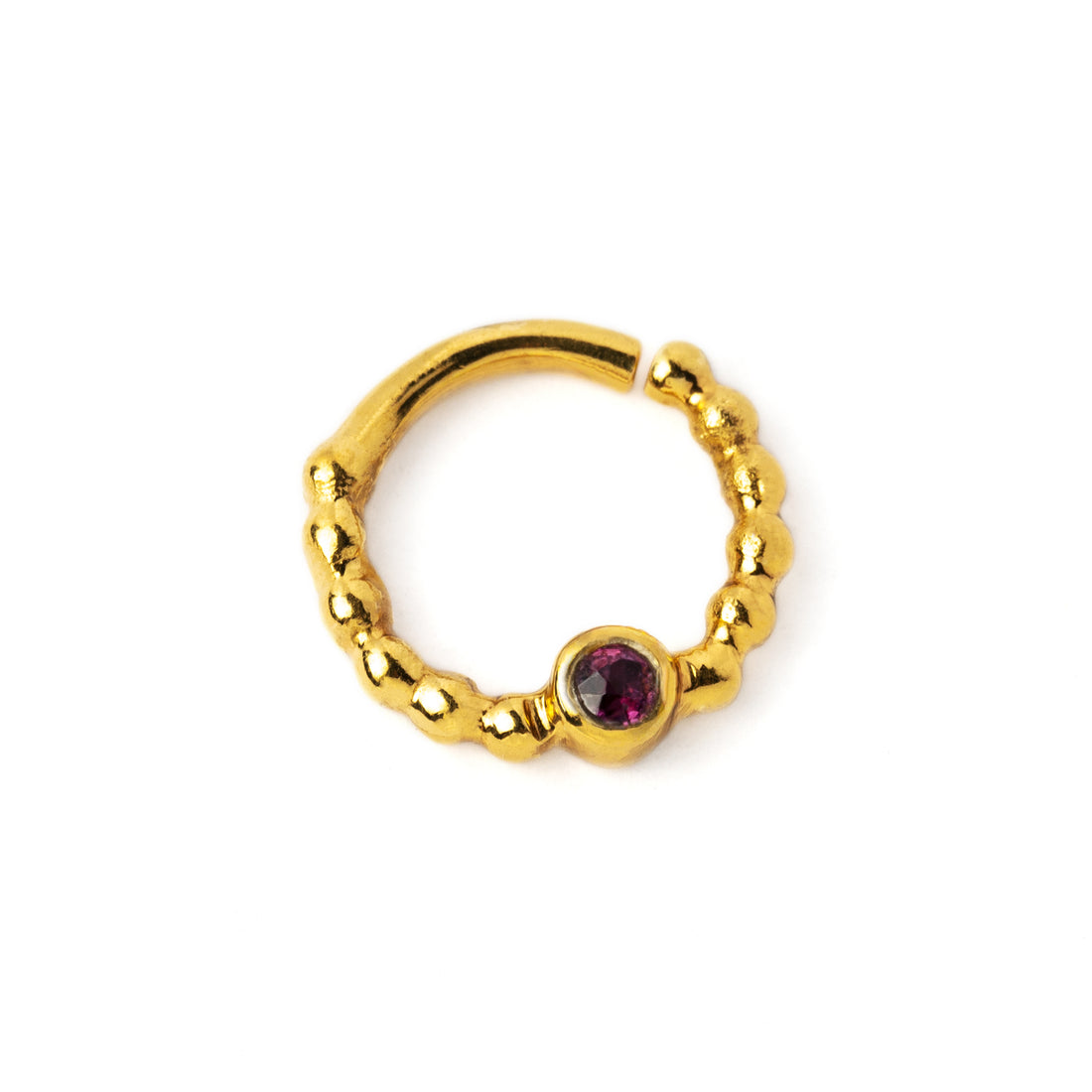 gold dotted septum ring with Garnet gemstone right side view